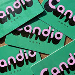 Green gift cards with 'candid home' branding on a textured surface